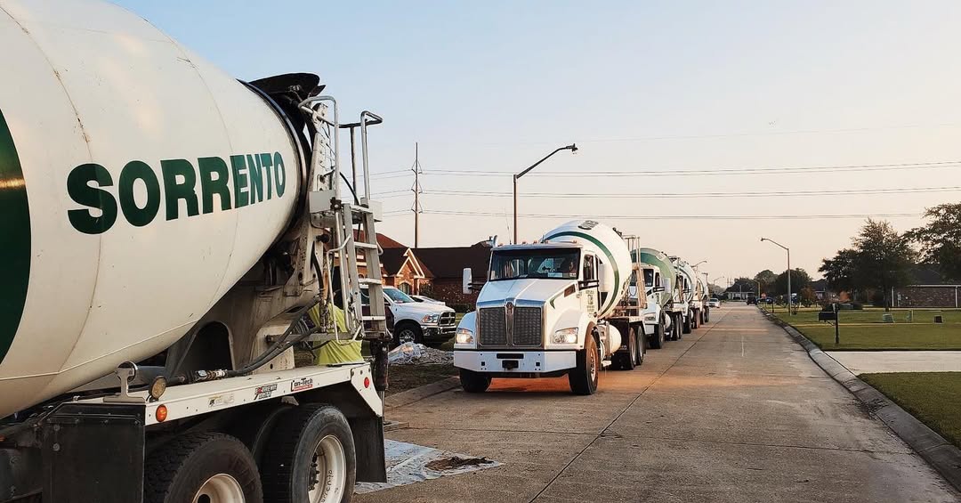 A line of Sorrento mixer trucks waiting their turn at a pour