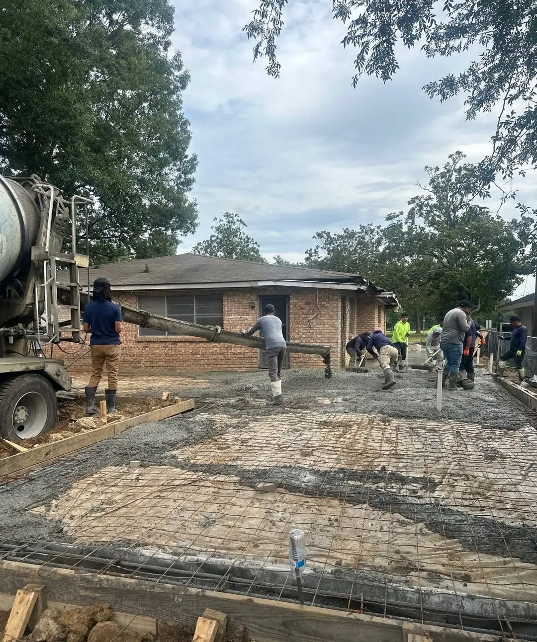 Turner Construction Services crew placing concrete from a Sorrento mixer truck at the Elemental Health project